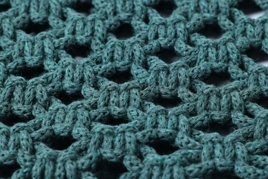 Photo of Handmade macrame shopping bag as background, closeup