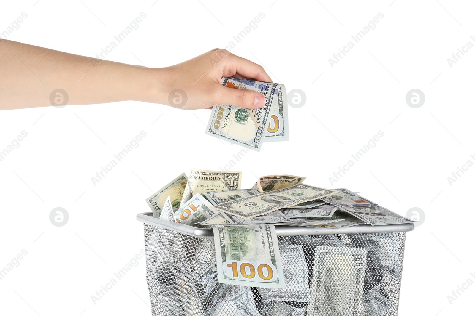 Photo of Woman throwing dollar banknote into trash bin on white background, closeup