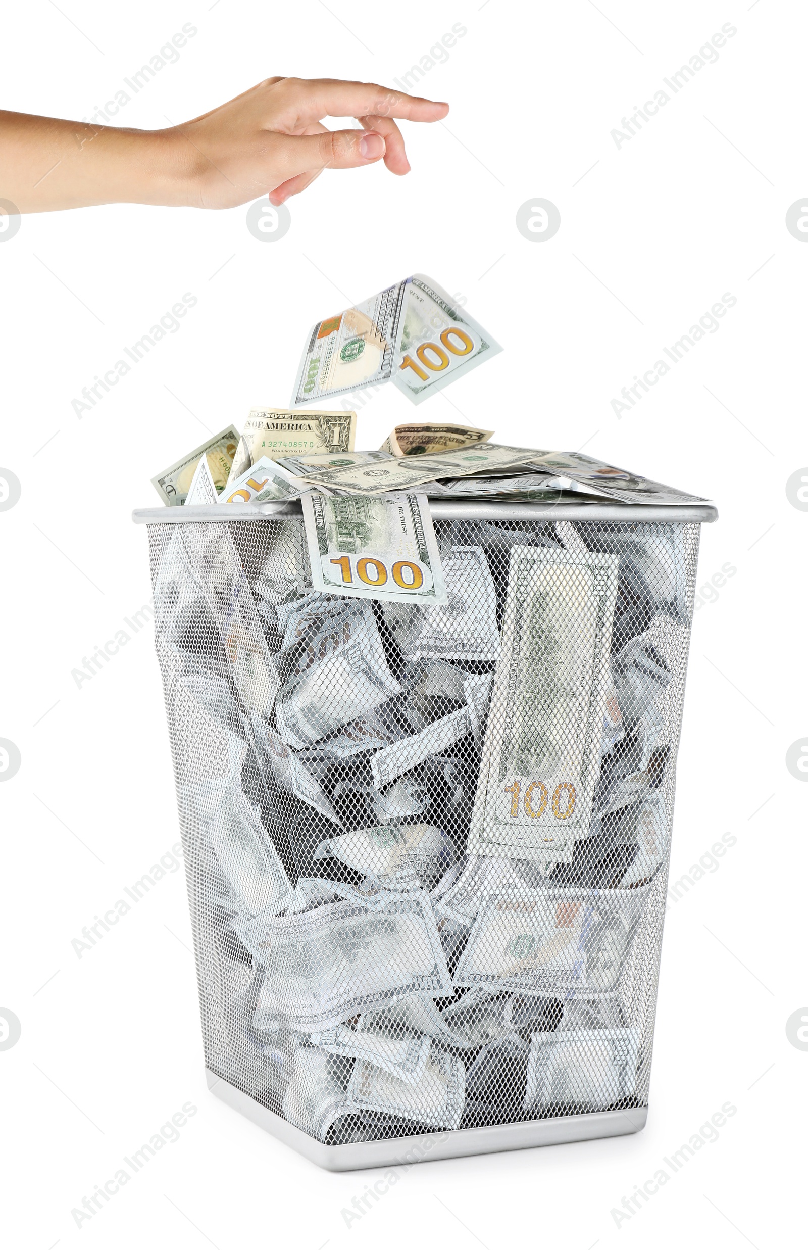 Photo of Woman throwing dollar banknote into trash bin on white background, closeup