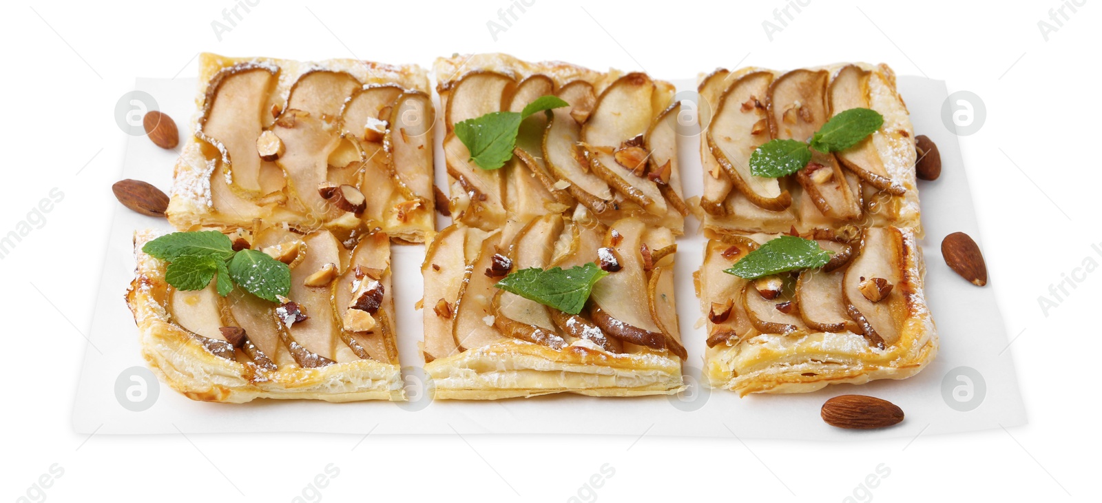 Photo of Pieces of tasty puff pastry pie with pears, mint and almonds isolated on white