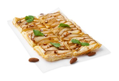 Photo of Pieces of tasty puff pastry pie with pears, mint and almonds isolated on white