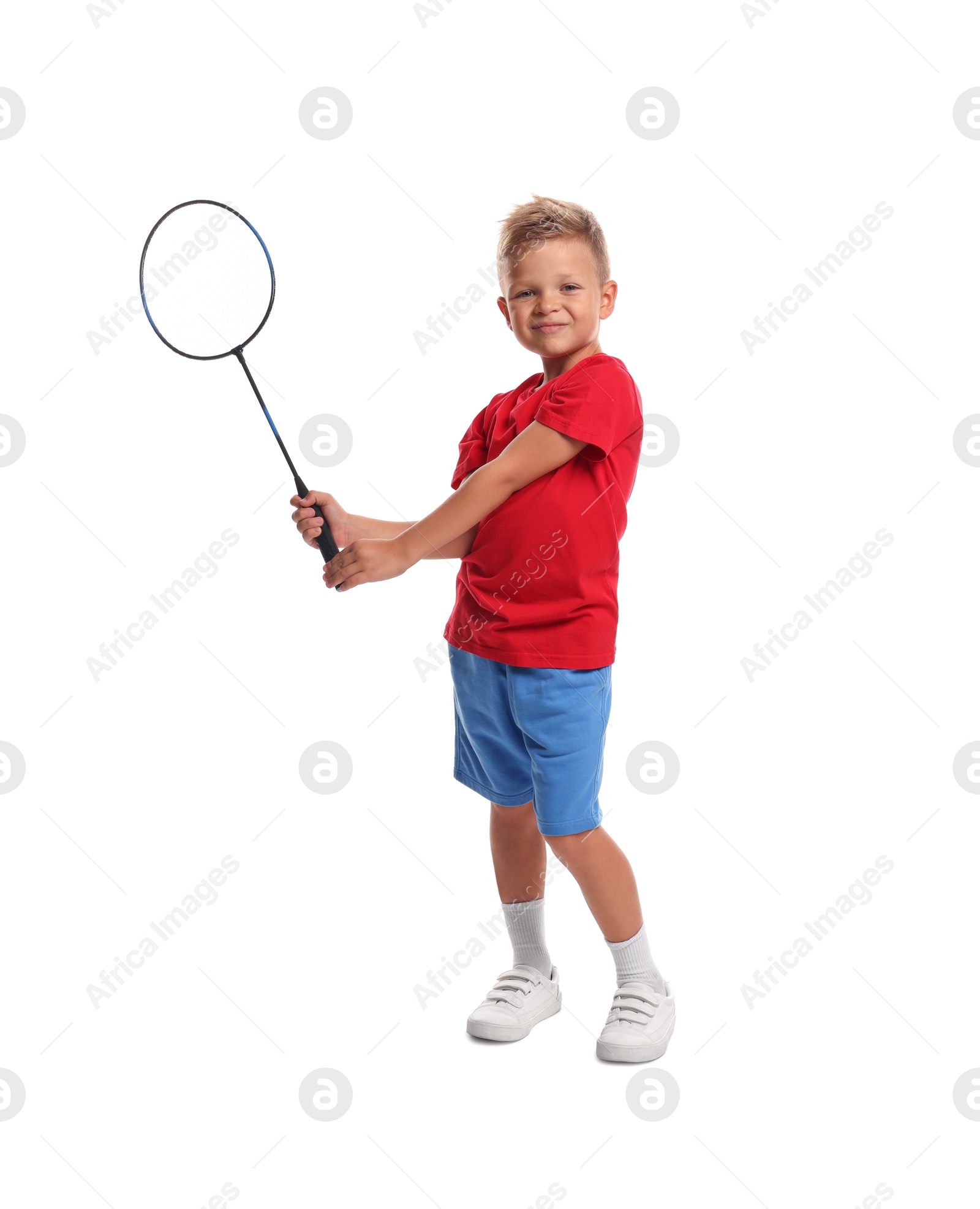 Photo of Little boy with badminton racket on white background