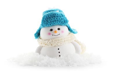 Photo of Cute decorative snowman and artificial snow isolated on white