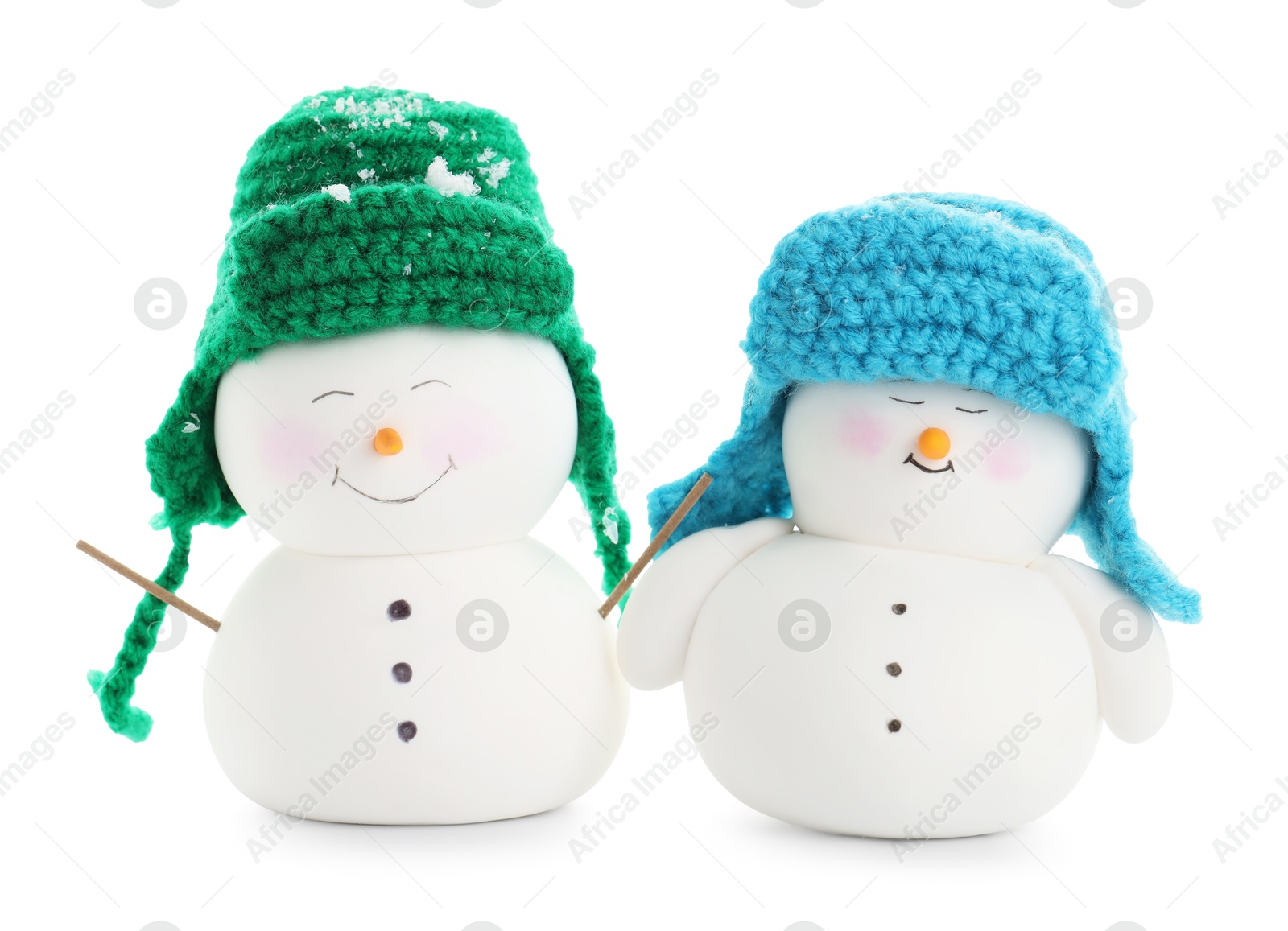 Photo of Two cute decorative snowmen isolated on white