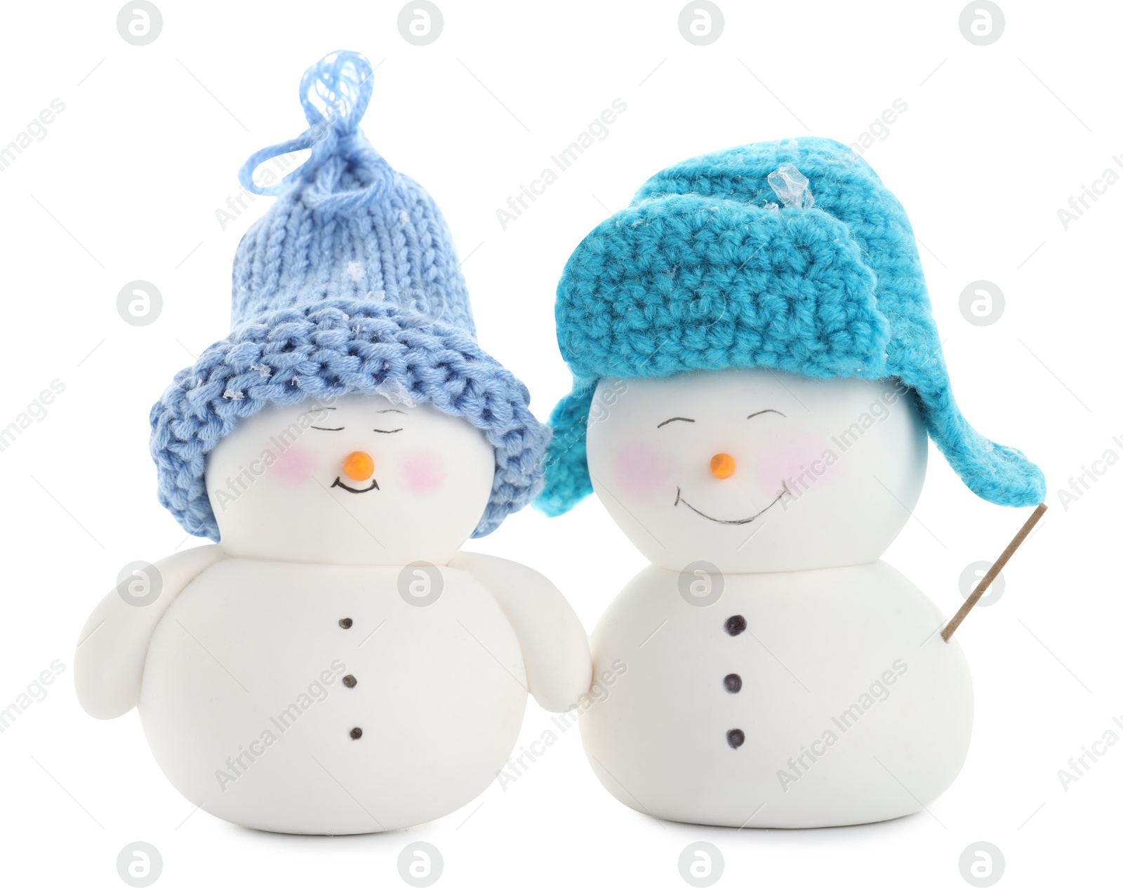 Photo of Two cute decorative snowmen isolated on white