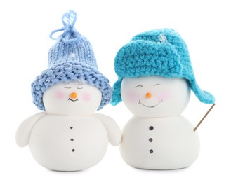 Photo of Two cute decorative snowmen isolated on white