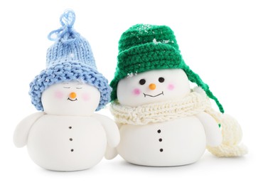 Photo of Two cute decorative snowmen isolated on white