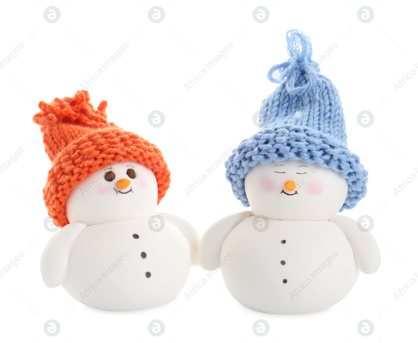 Photo of Two cute decorative snowmen isolated on white