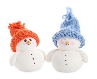 Photo of Two cute decorative snowmen isolated on white