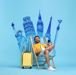 Happy traveler with suitcase and mobile phone sitting on deckchair against light blue background. Illustration of famous landmarks behind man