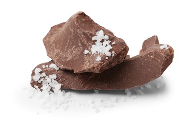 Photo of Pieces of chocolate with salt isolated on white