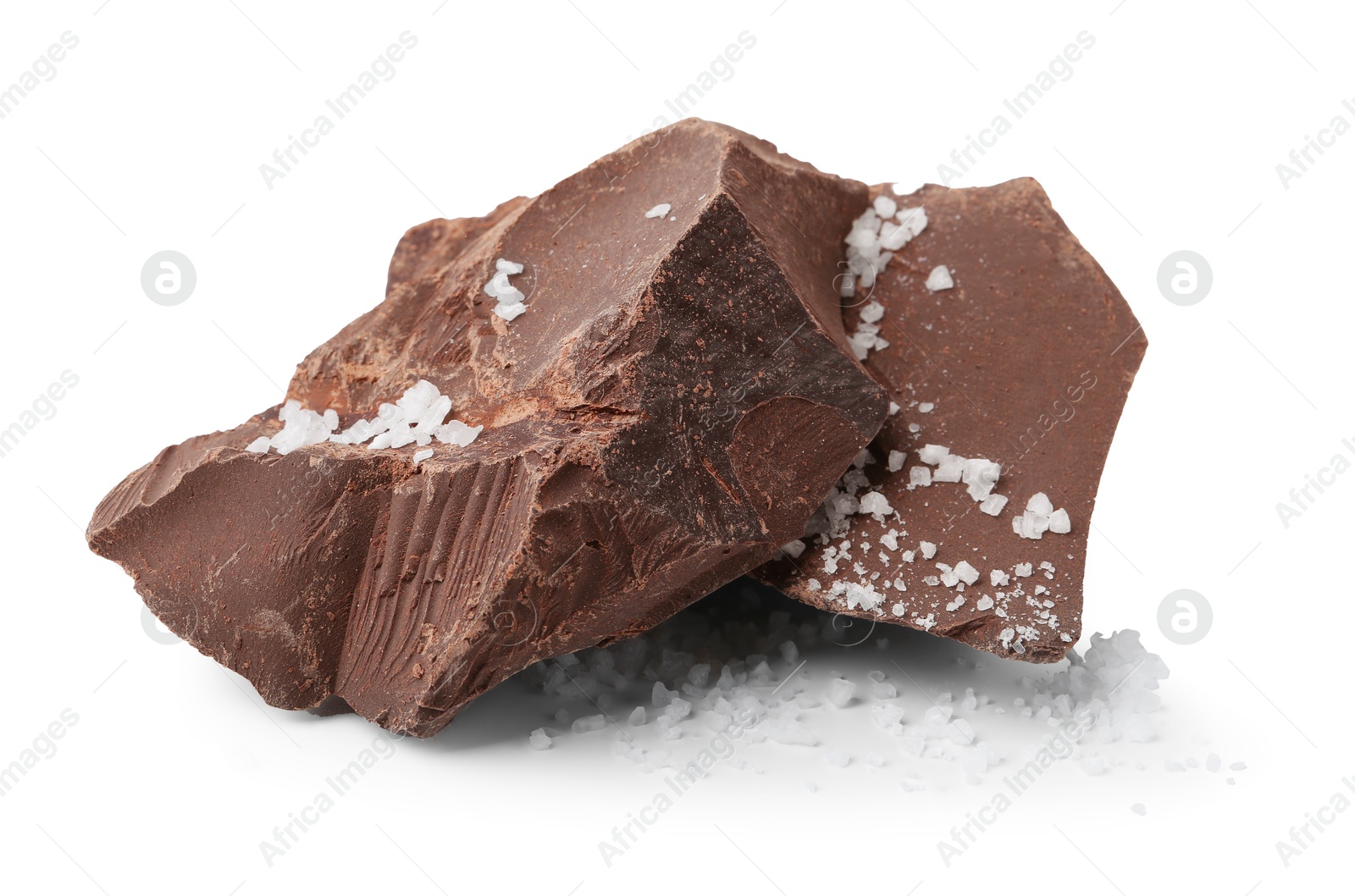 Photo of Pieces of chocolate with salt isolated on white