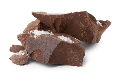 Photo of Pieces of chocolate with salt isolated on white