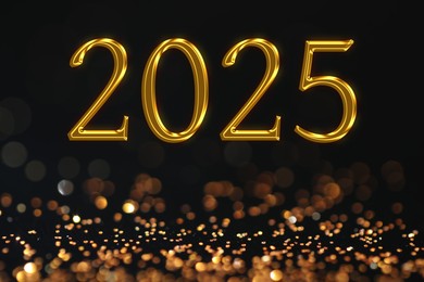 Image of 2025 New Year greeting card with golden sparkles