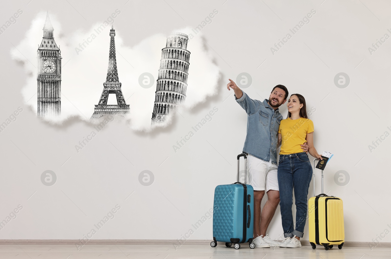 Image of Happy travelers with suitcases dreaming about journey near light grey wall. Illustration of famous landmarks in thought cloud