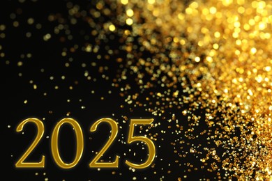 Image of 2025 New Year greeting card with golden sparkles