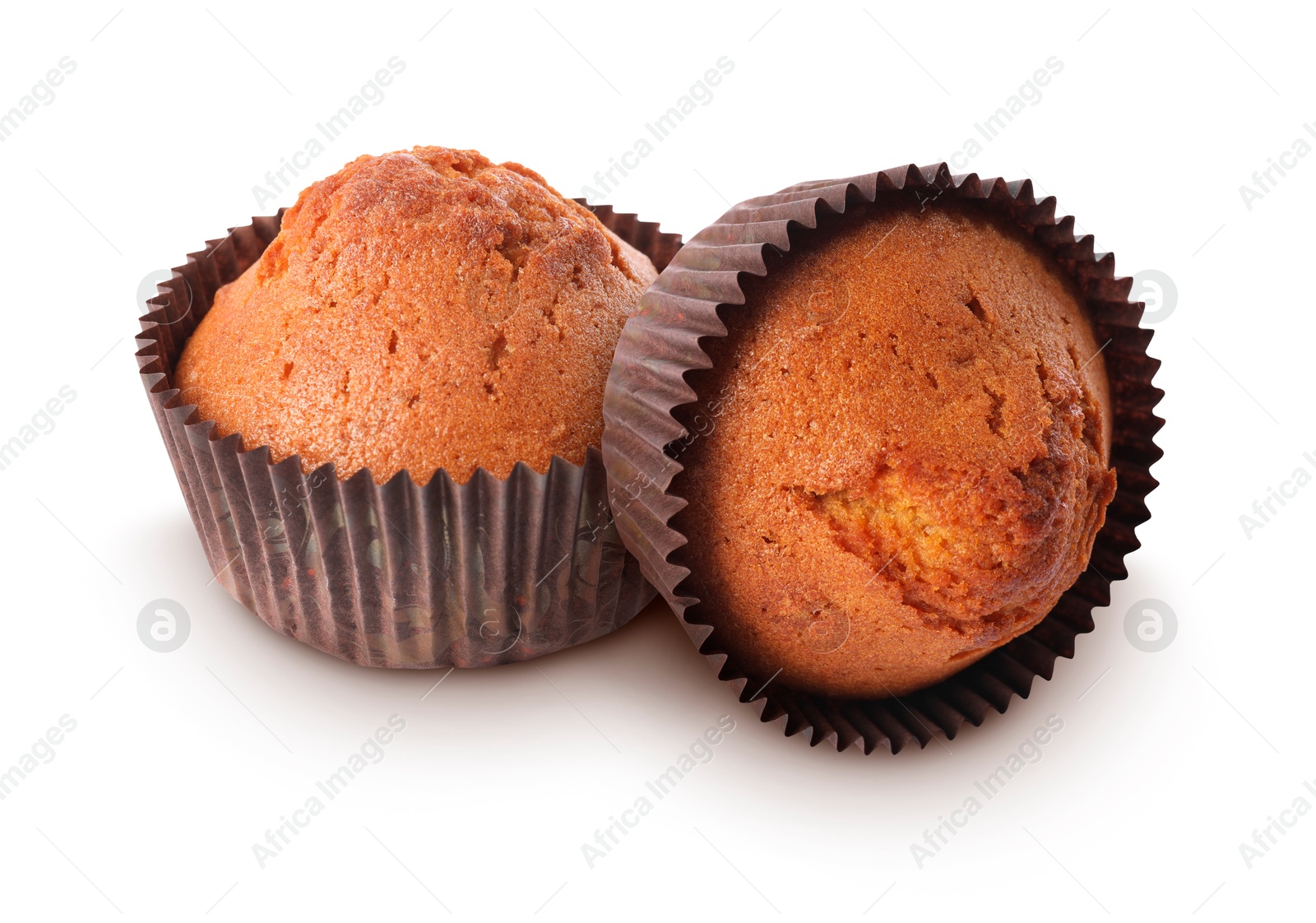 Image of Tasty muffins in cupcake liners isolated on white