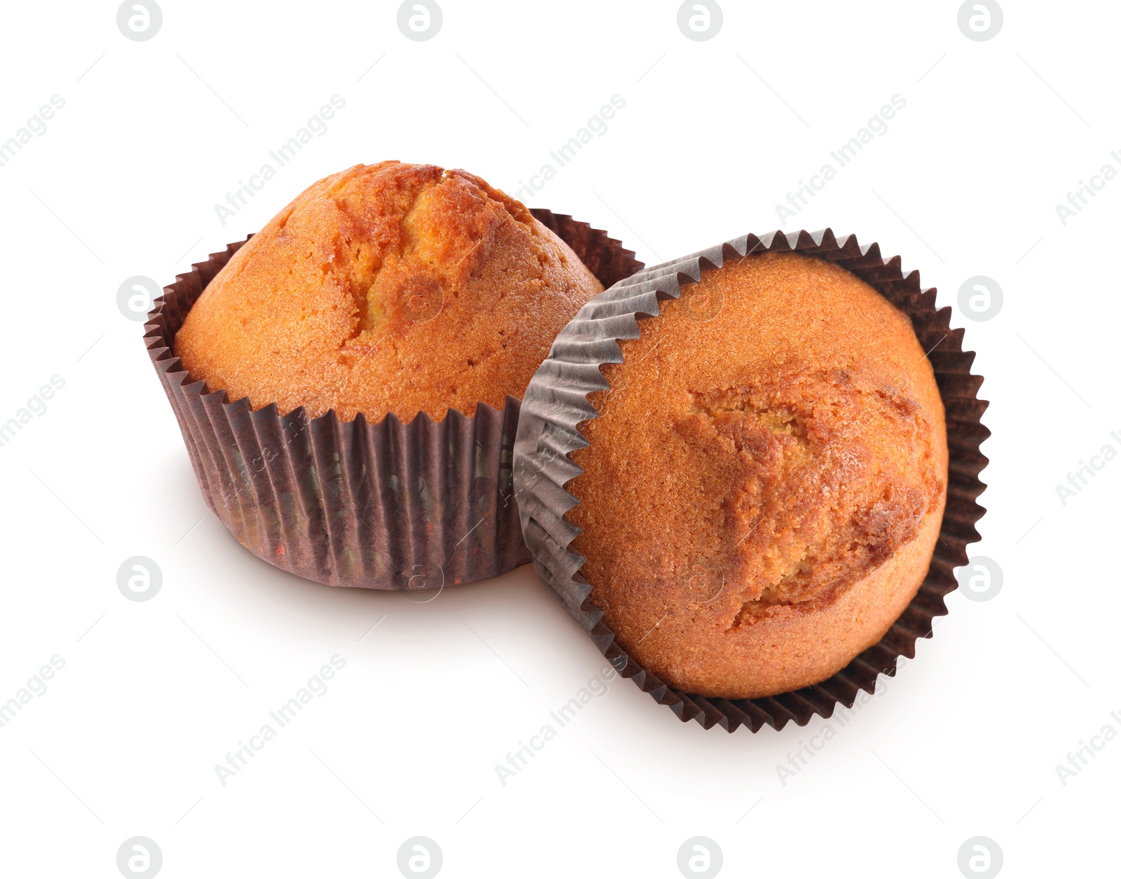 Image of Tasty muffins in cupcake liners isolated on white