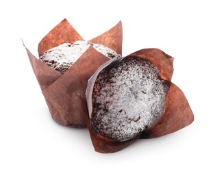 Image of Tasty chocolate muffins with powdered sugar isolated on white