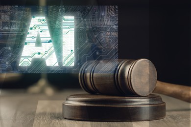 Image of Artificial intelligence and law. Judge's gavel on table and AI abbreviation