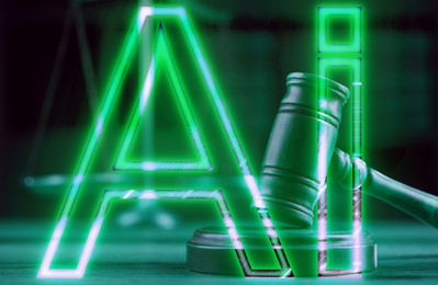 Artificial intelligence and law. Judge's gavel and AI abbreviation, toned in green