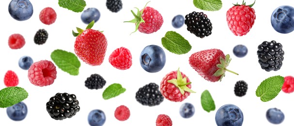 Image of Mix of fresh berries in air on white background