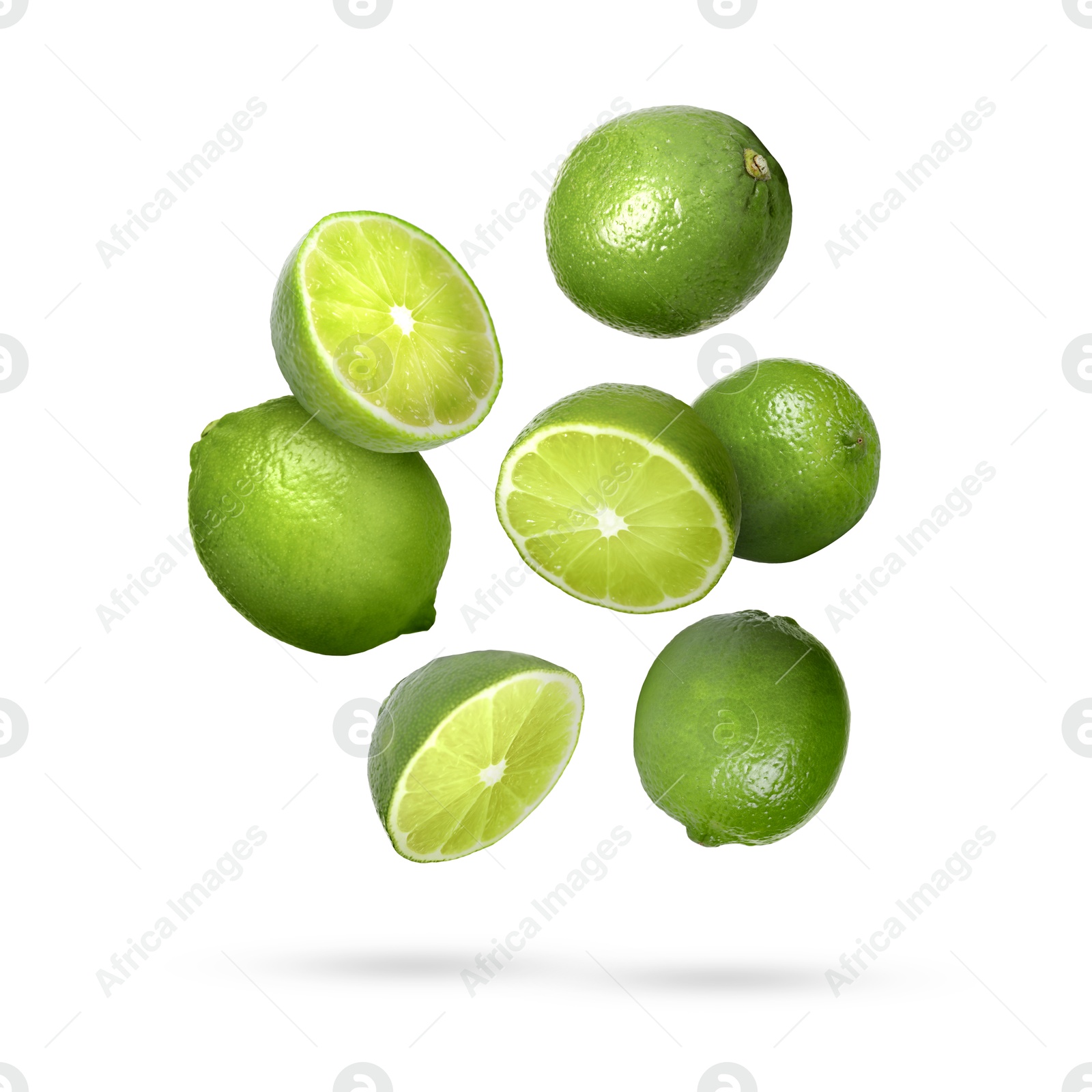 Image of Fresh ripe limes falling on white background