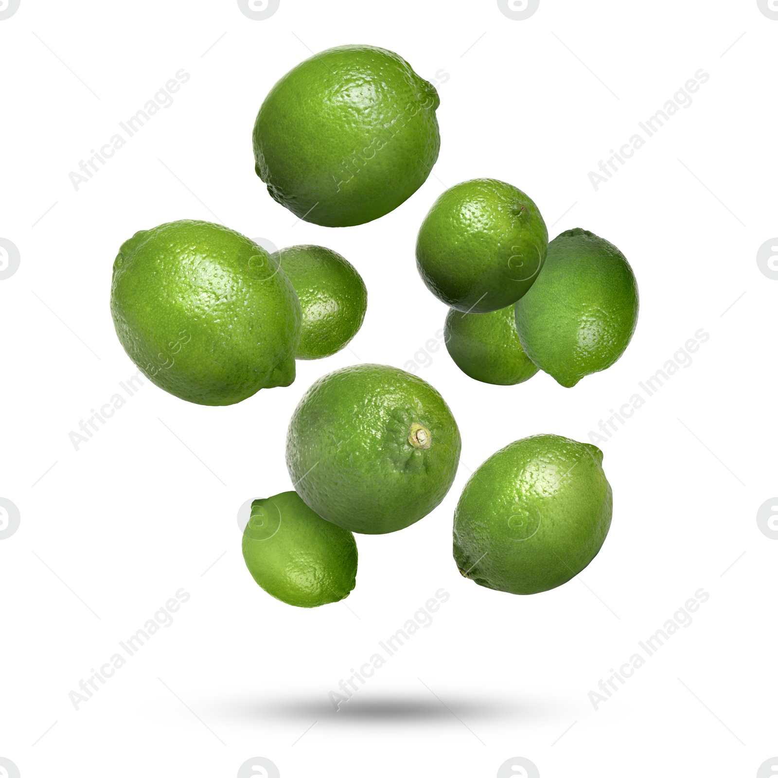 Image of Fresh ripe limes falling on white background