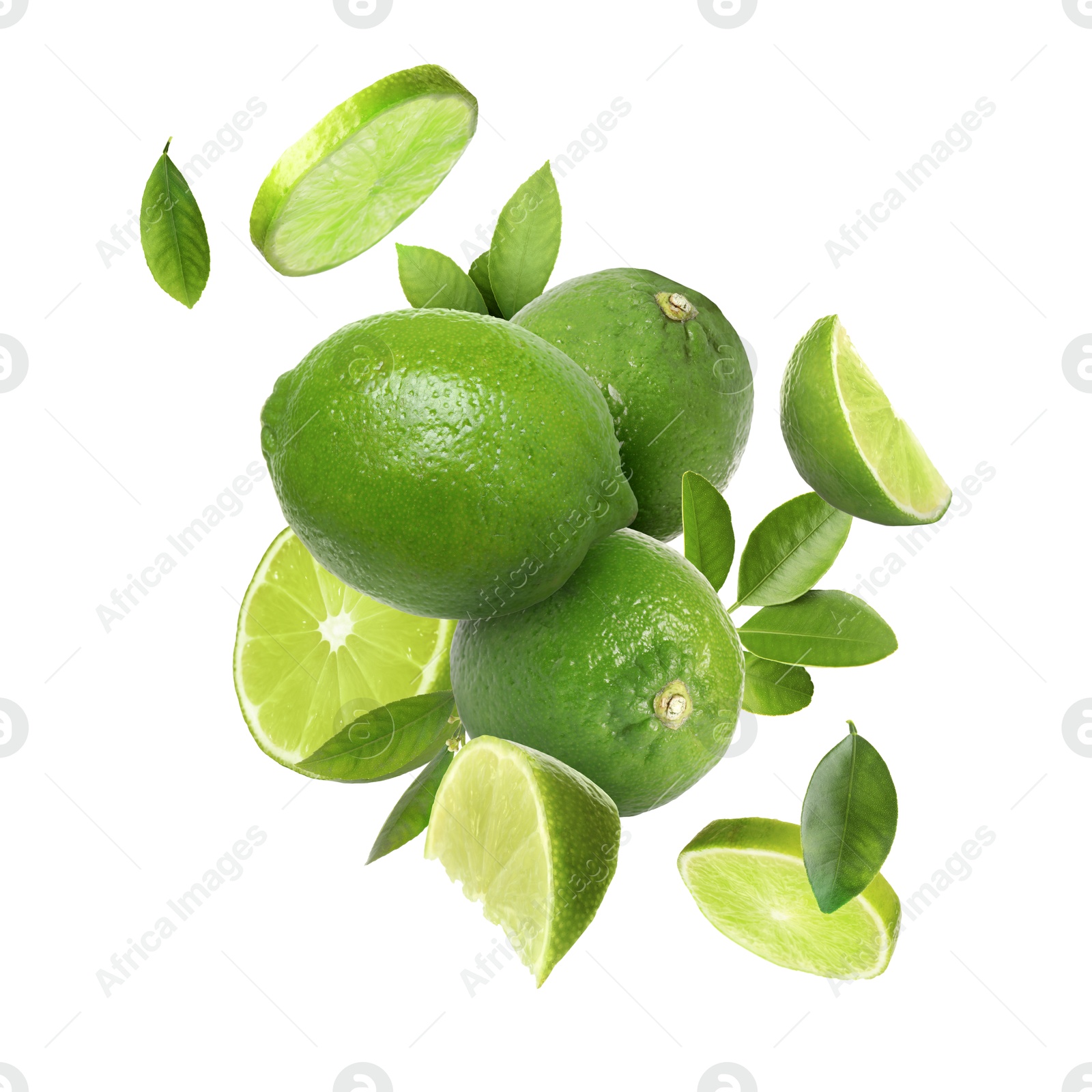 Image of Fresh ripe limes and green leaves in air on white background