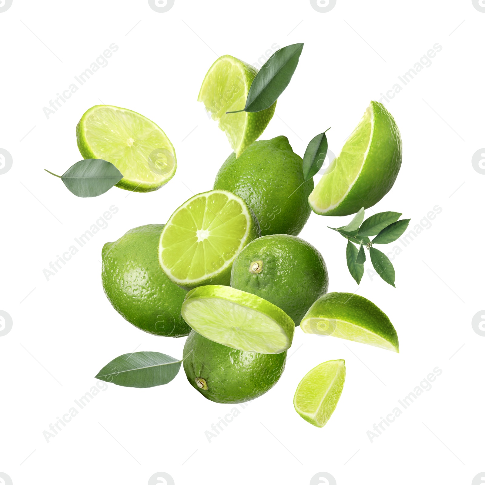 Image of Fresh ripe limes and green leaves in air on white background