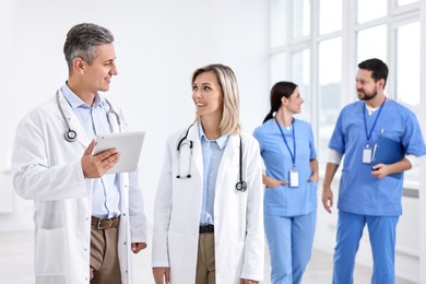 Photo of Healthcare workers in hospital, selective focus. Medical service