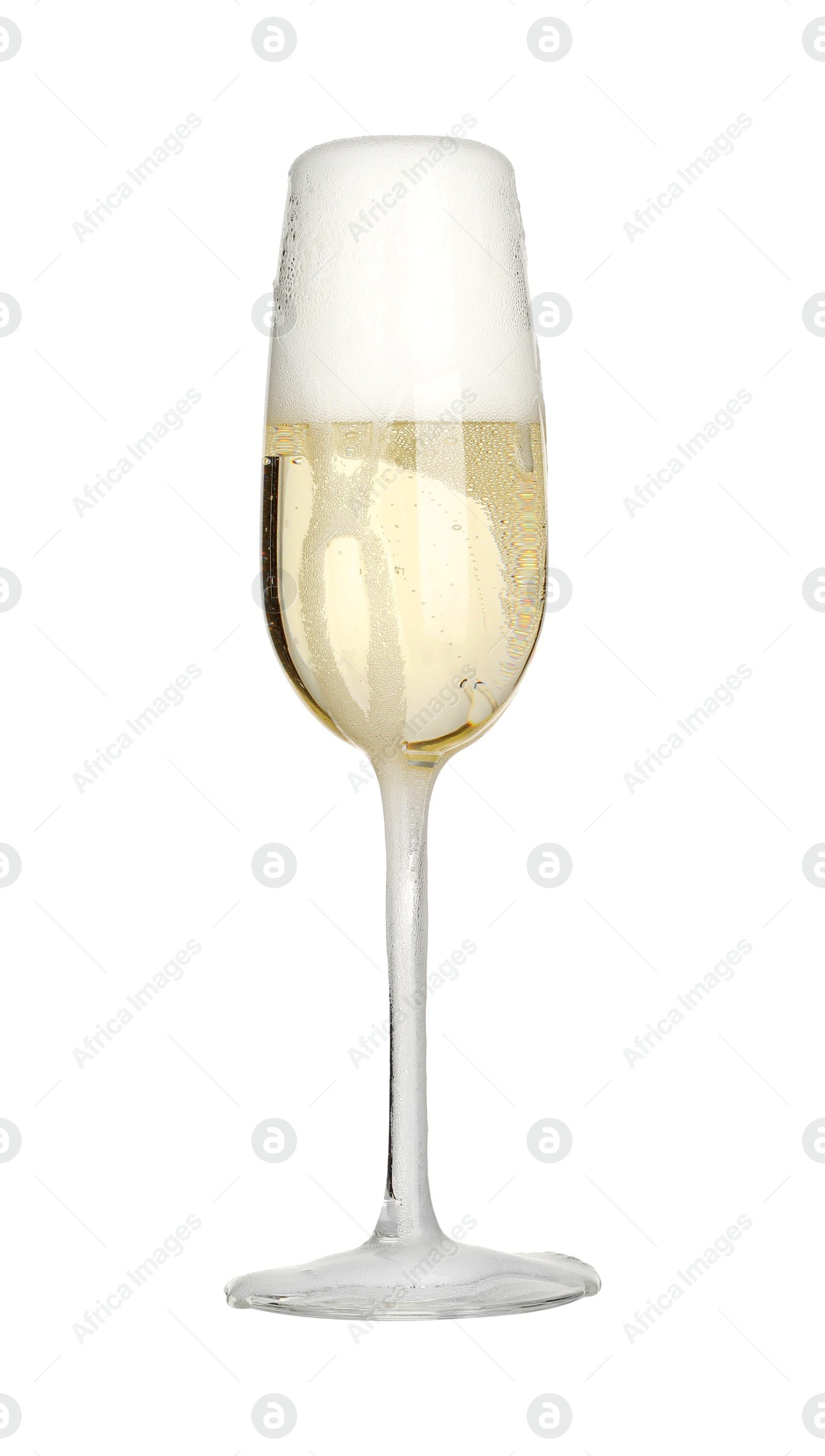 Photo of Glass overflowing with champagne isolated on white