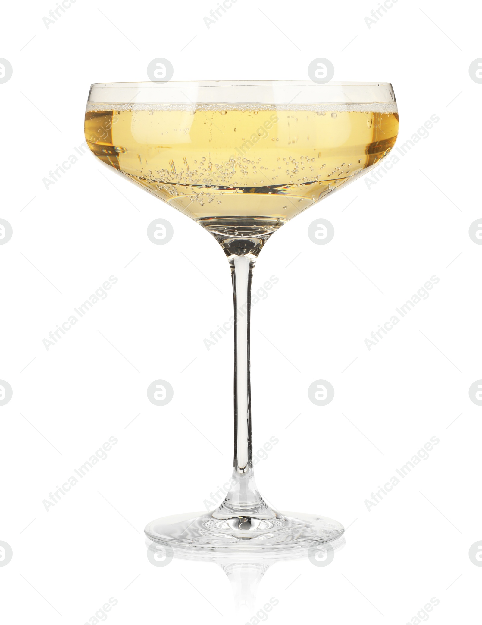 Photo of Champagne in glass isolated on white. Sparkling wine