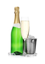 Photo of Champagne and bucket with ice isolated on white