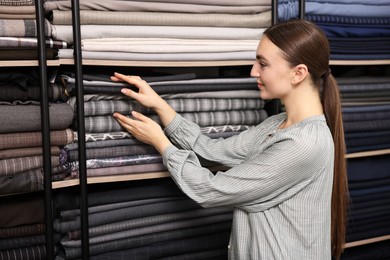 Atelier. Young woman working in professional workshop