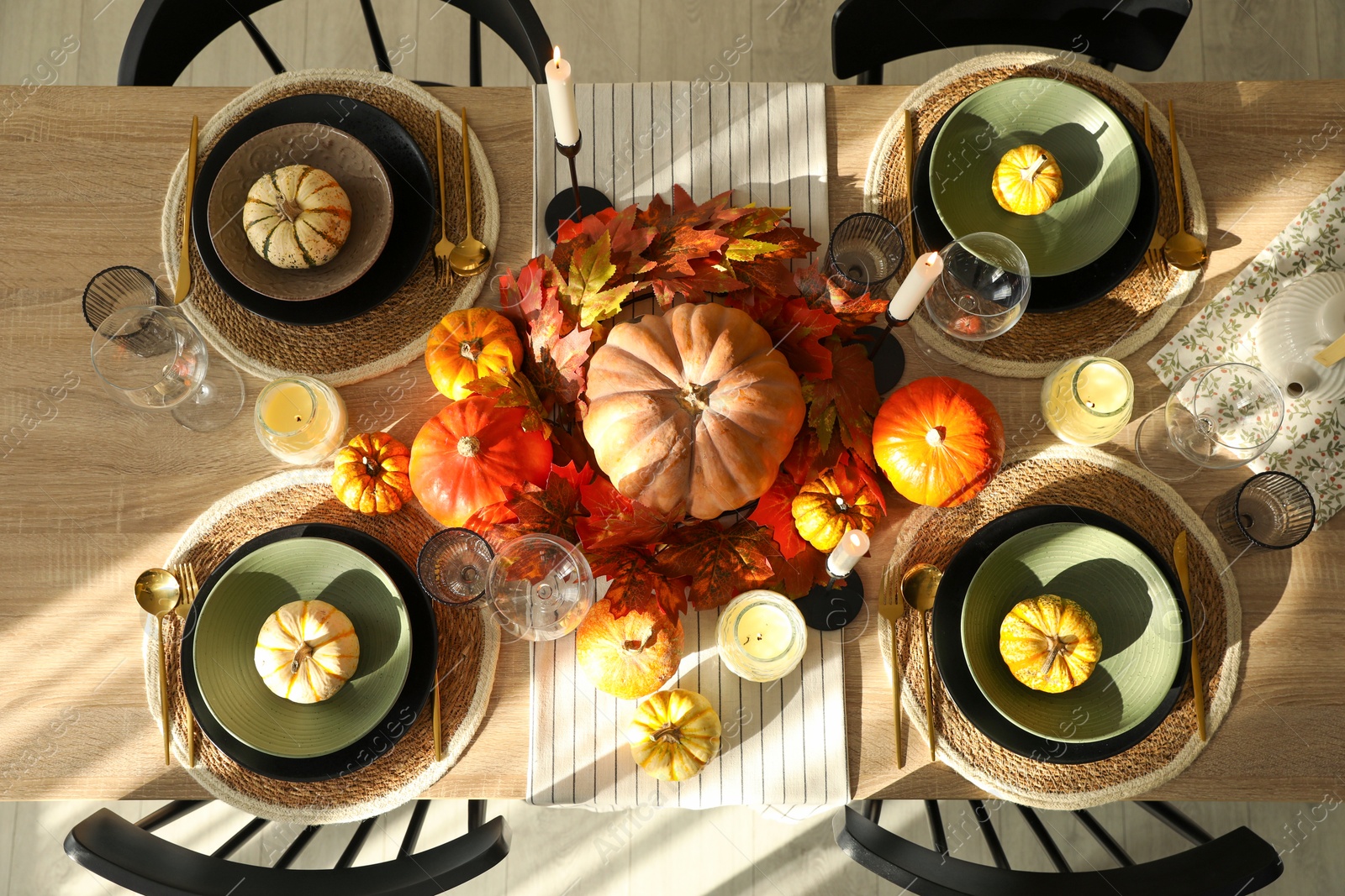 Photo of Stylish table setting with beautiful autumn decor in dining room, top view