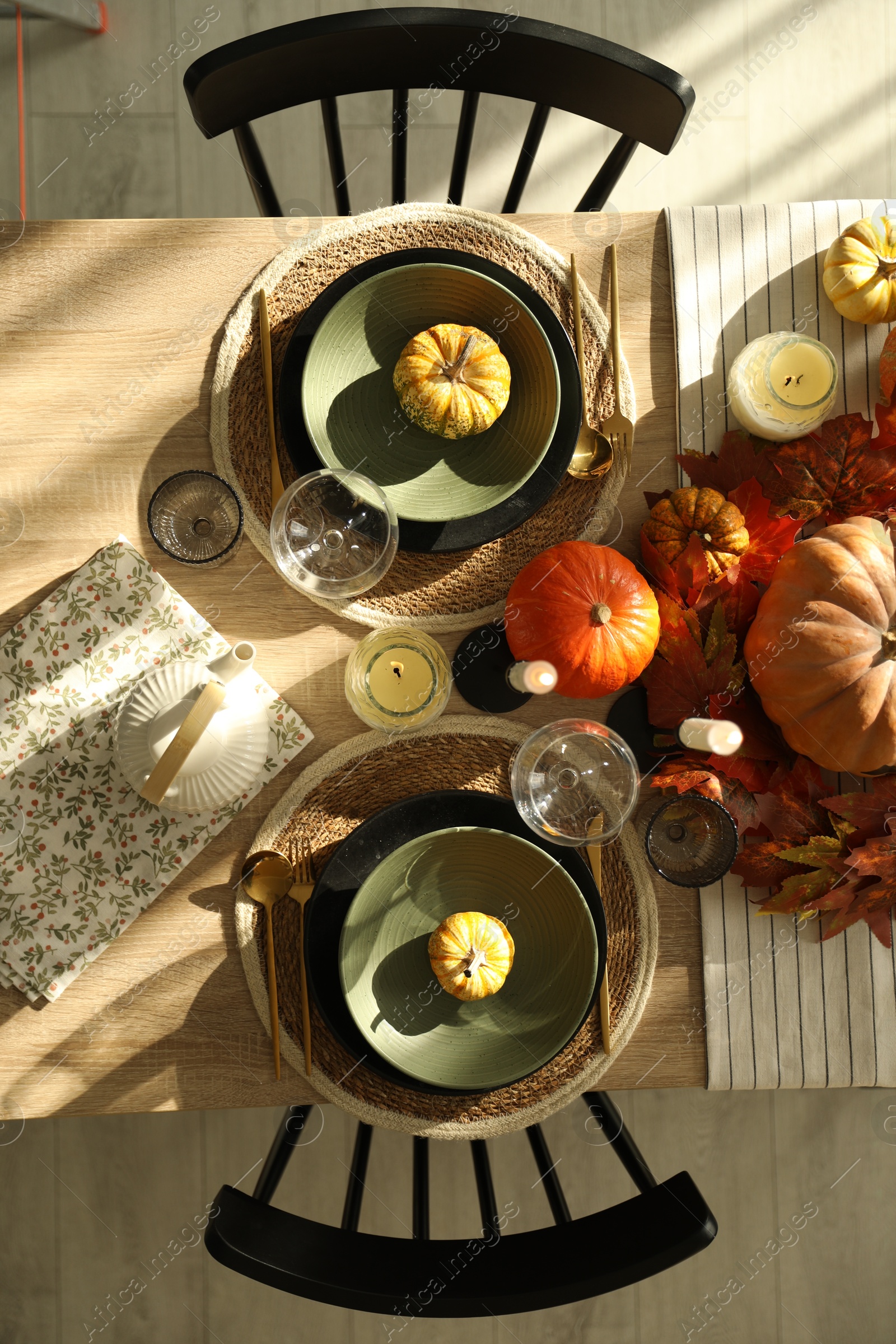 Photo of Stylish table setting with beautiful autumn decor in dining room, top view