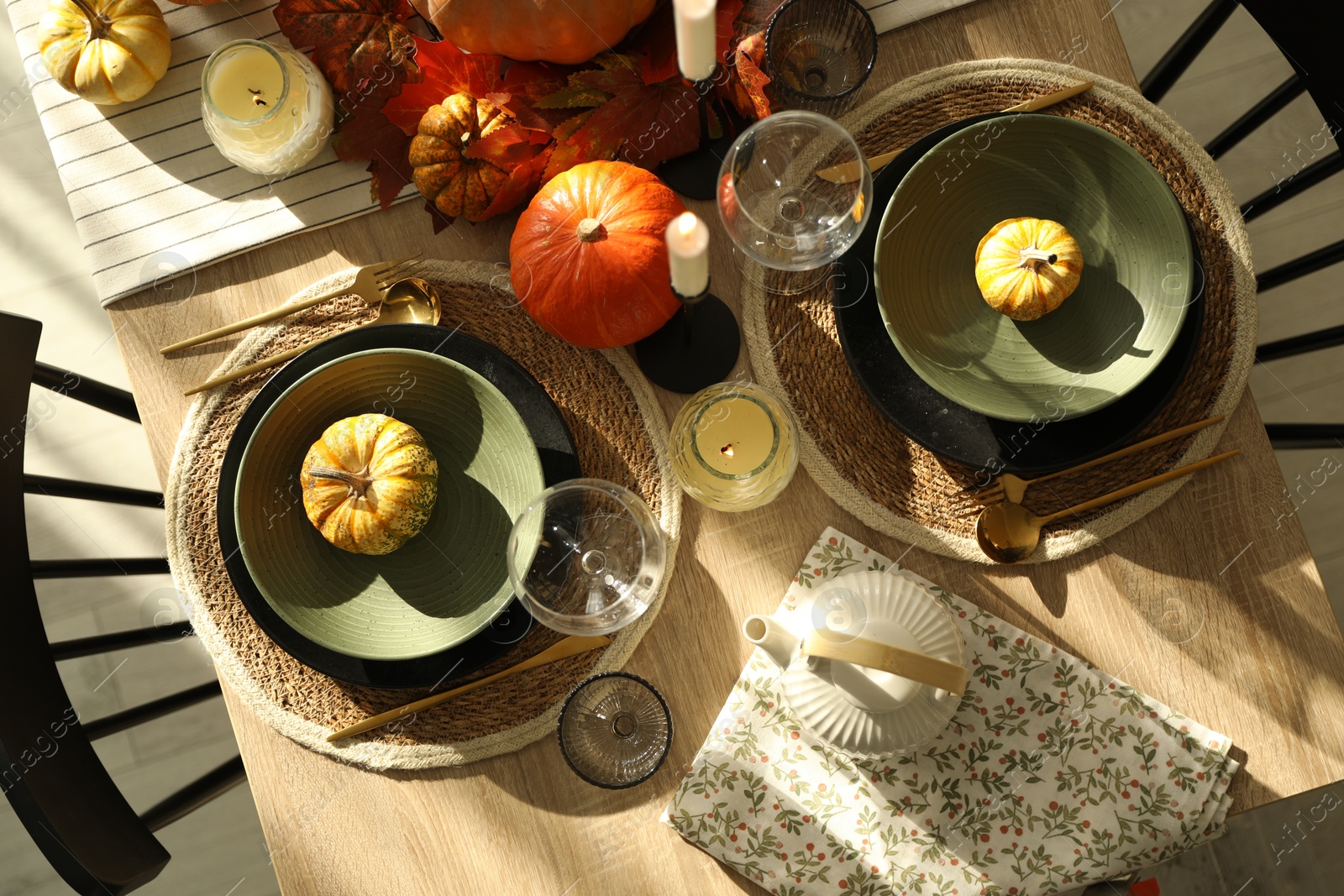 Photo of Stylish table setting with beautiful autumn decor in dining room, top view