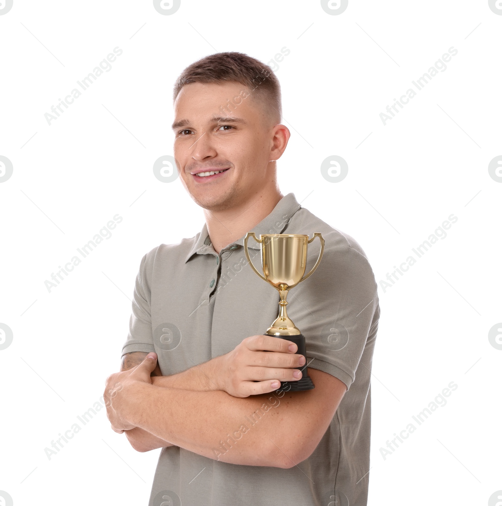 Photo of Happy winner with golden trophy cup on white background