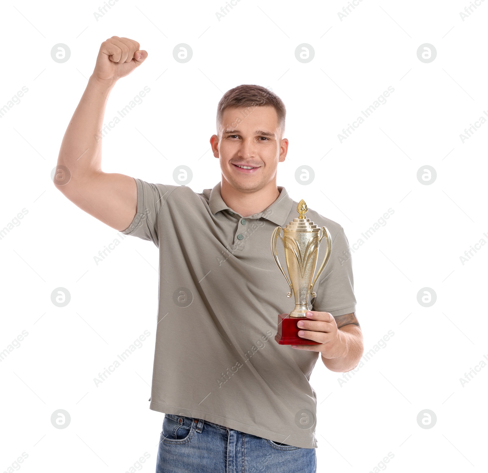 Photo of Happy winner with golden trophy cup on white background