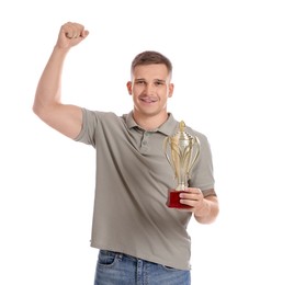 Photo of Happy winner with golden trophy cup on white background