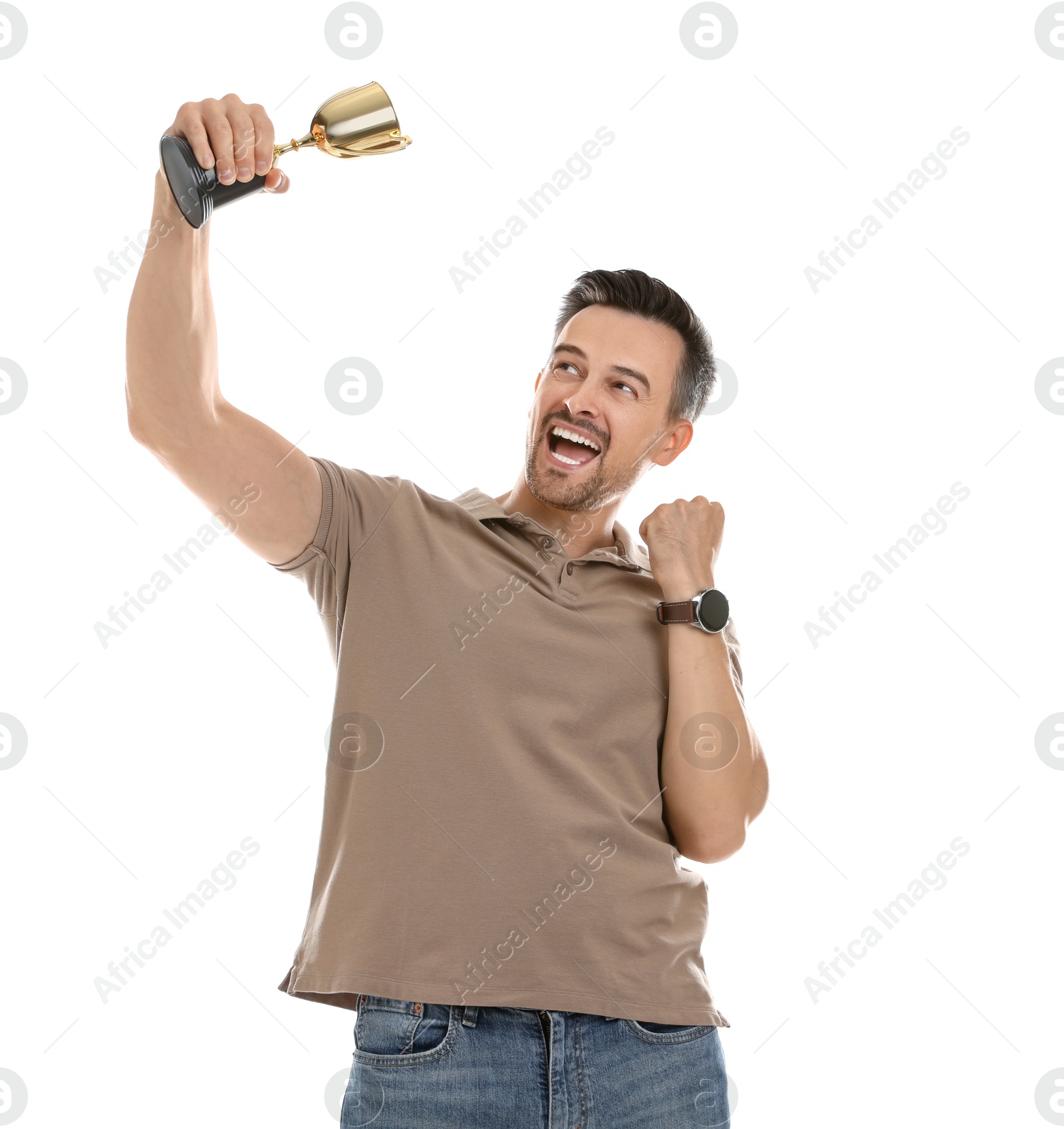 Photo of Happy winner with golden trophy cup on white background