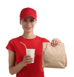 Photo of Fast-food worker with paper bag and cup on white background