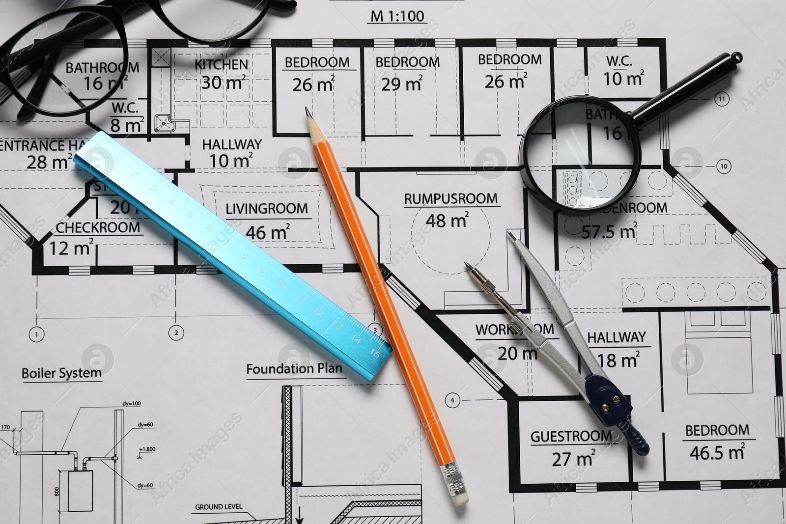 Photo of Pencil, dividers, ruler, glasses and magnifying glass on different engineering drawings, top view