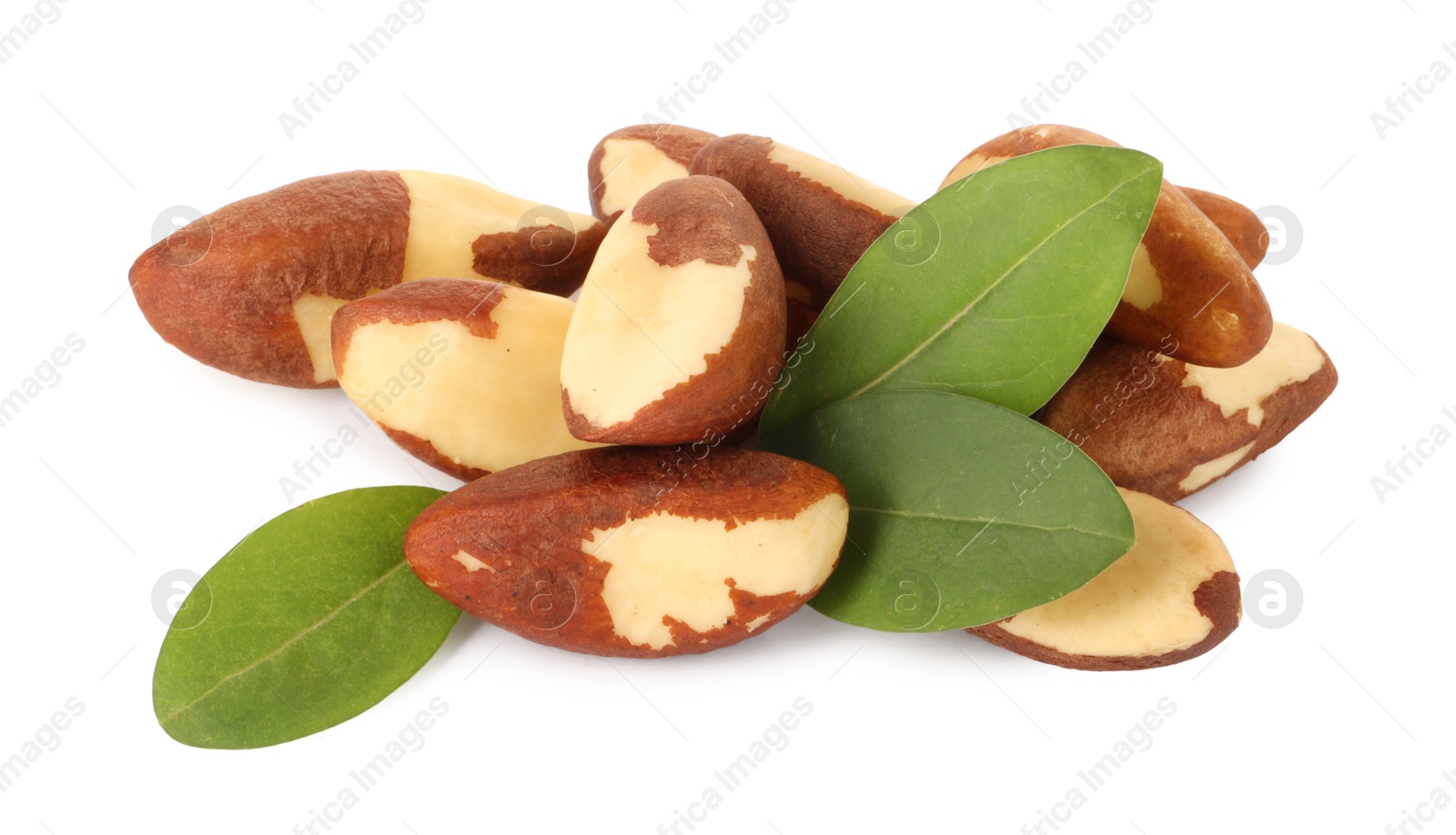 Photo of Tasty Brazil nuts with green leaves isolated on white