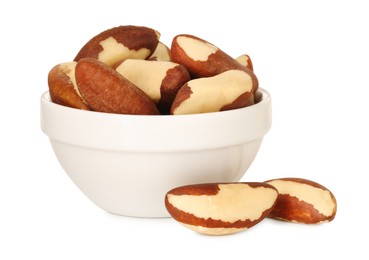 Photo of Tasty Brazil nuts in bowl isolated on white