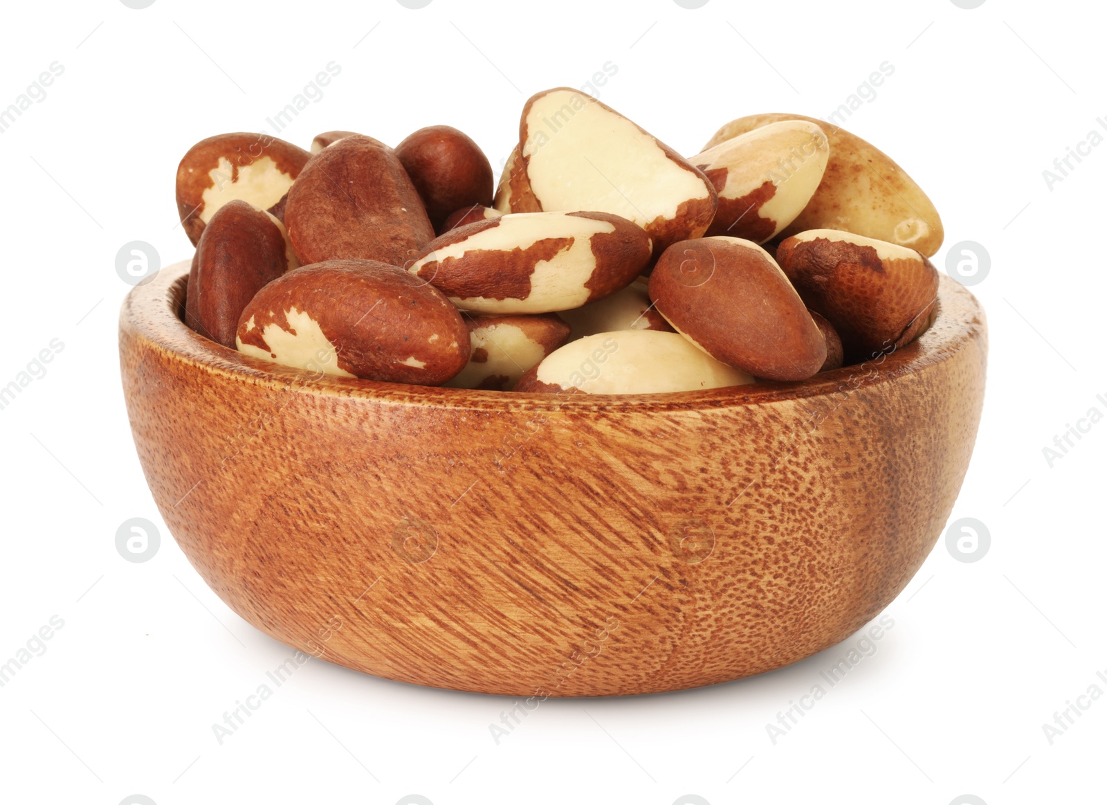 Photo of Tasty Brazil nuts in bowl isolated on white