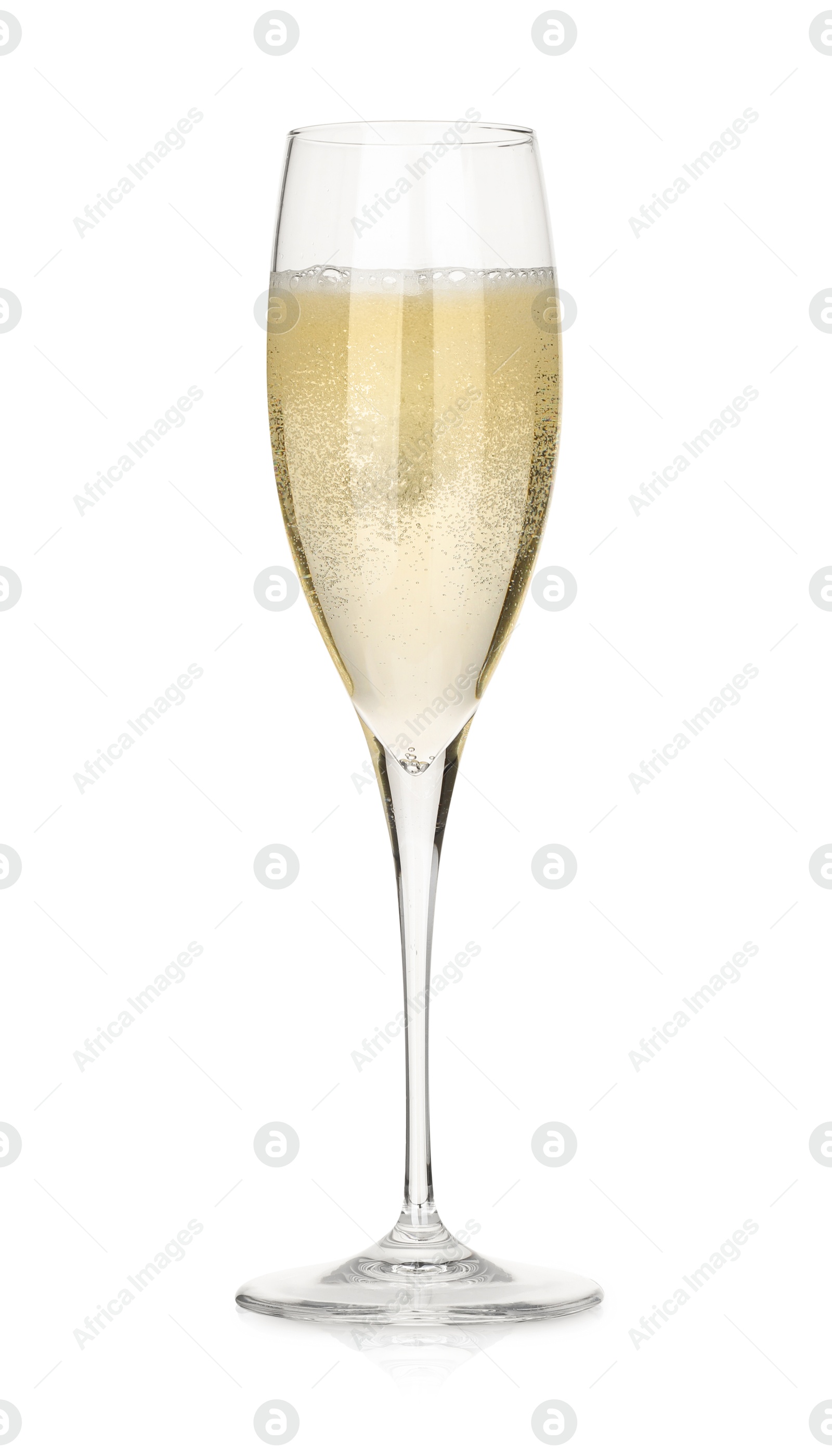 Photo of Pouring champagne into glass isolated on white