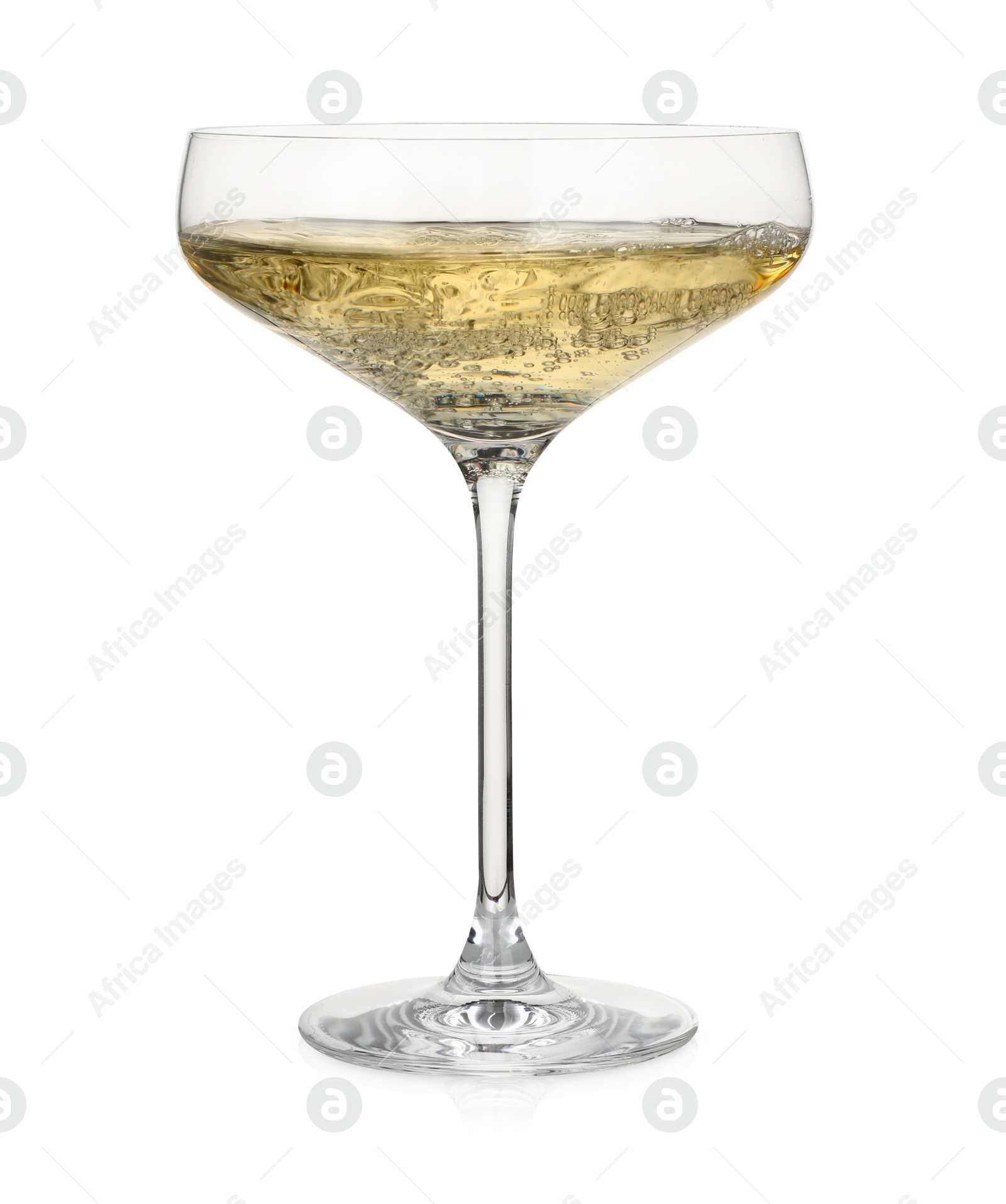 Photo of Pouring champagne into glass isolated on white