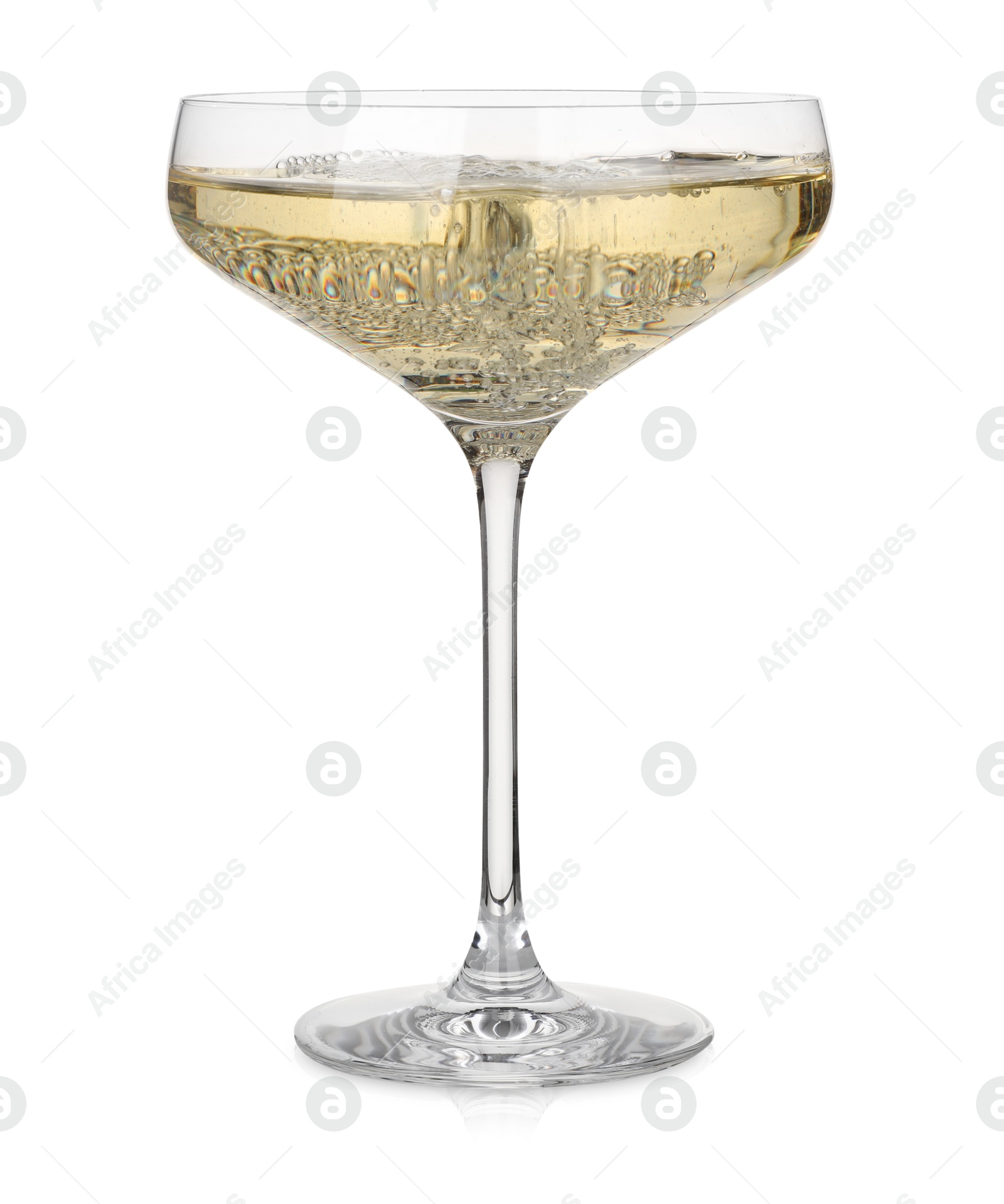 Photo of Pouring champagne into glass isolated on white